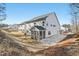 Exterior view of home, featuring a screened porch and landscaped grounds at 3297 Oakfields Rd # 1, New Hill, NC 27562