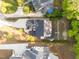 An aerial of the roof and backyard, showcasing well-maintained landscaping and neighborhood at 3316 Milton Rd, Raleigh, NC 27609