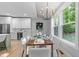 Charming dining area adjacent to the kitchen, perfect for Gathering meals at 3316 Milton Rd, Raleigh, NC 27609