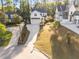 Desirable property with a spacious driveway and meticulously landscaped yard, offering great curb appeal at 3316 Milton Rd, Raleigh, NC 27609