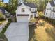 Charming two-story home featuring a manicured lawn and a convenient two-car garage at 3316 Milton Rd, Raleigh, NC 27609