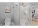 Modern bathroom featuring a glass-enclosed shower with tiled walls and a stylish fixture at 3316 Milton Rd, Raleigh, NC 27609