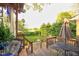 Charming outdoor deck with dining and seating areas, perfect for entertaining and relaxation at 3517 Elk St, Burlington, NC 27215