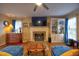 Living room showcasing a fireplace, hardwood floors, and comfortable furniture arrangement at 3517 Elk St, Burlington, NC 27215