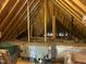 Unfinished attic space featuring exposed rafters, insulation-wrapped ducts and HVAC unit for climate control at 4103 Cheek Point Pl, Burlington, NC 27215