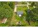 Aerial view of a home with mature trees and landscaping at 423 Orange Heights Rd, Hillsborough, NC 27278