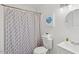 Clean bathroom with modern fixtures, a patterned shower curtain, and fresh, folded towels at 423 Orange Heights Rd, Hillsborough, NC 27278