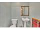 Bathroom featuring a pedestal sink and toilet at 480 Big Branch Dr, Pittsboro, NC 27312