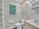 View of toilet, sink, and towel bar inside the bathroom at 480 Big Branch Dr, Pittsboro, NC 27312