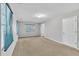 Spacious carpeted bedroom featuring natural light from the windows at 480 Big Branch Dr, Pittsboro, NC 27312
