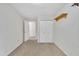 Cozy bedroom featuring neutral carpet, a closet, and ample natural light, perfect for relaxation and rest at 480 Big Branch Dr, Pittsboro, NC 27312
