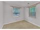 Bedroom with carpet flooring and a pair of windows with blinds at 480 Big Branch Dr, Pittsboro, NC 27312