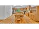 Eat-in kitchen with light wood cabinets, an island, stainless steel appliances, and natural lighting from a large window at 480 Big Branch Dr, Pittsboro, NC 27312