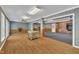 Bright, open-concept living area with a fireplace, hard wood floors, and ample natural light at 480 Big Branch Dr, Pittsboro, NC 27312