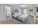 Serene main bedroom with neutral decor and a view into the en suite bathroom at 480 Big Branch Dr, Pittsboro, NC 27312