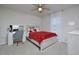 Bright bedroom featuring a ceiling fan, a window with sheer curtains, and a cute Hello Kitty decor at 490 Mallard Loop Dr Dr, Clayton, NC 27527