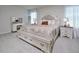 Inviting primary bedroom with a plush bed, a decorative vanity, and plenty of natural light at 490 Mallard Loop Dr Dr, Clayton, NC 27527