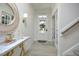 Bright entryway featuring wood-look tile flooring, decorative accents, and a view of the front door at 490 Mallard Loop Dr Dr, Clayton, NC 27527
