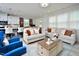 Open-concept living space with kitchen, dining area, and comfortable seating arrangement at 490 Mallard Loop Dr Dr, Clayton, NC 27527
