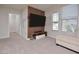 Living room with TV, modern media unit, and comfortable seating area at 490 Mallard Loop Dr Dr, Clayton, NC 27527