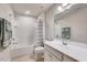 Well-maintained bathroom showcasing a shower over bath, and a vanity at 518 Judge Ct, Durham, NC 27703