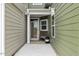 Cozy entrance with a bench, offering a welcoming first impression to guests at 518 Judge Ct, Durham, NC 27703