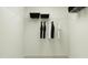 Walk-in closet with wire shelving and hanging rods for organized storage at 533 Morning Light Dr # 33, Angier, NC 27501