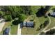 Beautiful aerial view of home with a long driveway, large yard, and mature landscaping at 530 Turlington Rd, Dunn, NC 28334
