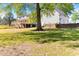 Expansive backyard with a lush green lawn and a deck great for outdoor activities at 530 Turlington Rd, Dunn, NC 28334