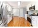 Bright and airy kitchen featuring stainless steel appliances and ample counter space at 530 Turlington Rd, Dunn, NC 28334