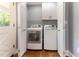 Convenient laundry room with modern washer and dryer units and ample storage at 530 Turlington Rd, Dunn, NC 28334