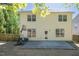 Spacious backyard featuring a patio, basketball hoop, and mature trees at 6 Dawson Ct Ct, Durham, NC 27703