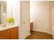 Bathroom featuring a single sink vanity with white countertop and a shower with white tub at 6 Dawson Ct Ct, Durham, NC 27703