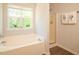 Bright bathroom with tub and separate shower at 6 Dawson Ct Ct, Durham, NC 27703