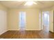 Bedroom featuring wood-look floors and natural light at 6 Dawson Ct Ct, Durham, NC 27703
