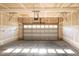 A clean, spacious garage with an automatic door, ready for vehicles and storage at 6 Dawson Ct Ct, Durham, NC 27703