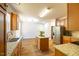 Well-appointed kitchen with stainless steel appliances, granite countertops, an island, and abundant natural light at 6 Dawson Ct Ct, Durham, NC 27703