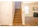 Staircase featuring wood-look floors and natural light at 6 Dawson Ct Ct, Durham, NC 27703
