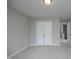 Bedroom featuring a closet with double doors and neutral-colored walls at 6022 Four Townes Lane Ln, Raleigh, NC 27616