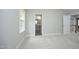 Spacious bedroom with neutral carpet and light gray walls at 6022 Four Townes Lane Ln, Raleigh, NC 27616