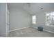 Bedroom with plush carpet and a window letting in natural light at 6022 Four Townes Lane Ln, Raleigh, NC 27616