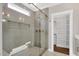 Bathroom shower and walk-in closet with modern tiling and design at 67 Farmstead Ct, Wendell, NC 27591