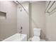 Modern bathroom featuring a tiled shower and a toilet at 67 Farmstead Ct, Wendell, NC 27591