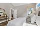Bright, cozy bedroom featuring hardwood floors, neutral colors, and ample natural light at 67 Farmstead Ct, Wendell, NC 27591