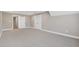 This bedroom features neutral walls, carpet, and closet doors leading to other rooms at 67 Farmstead Ct, Wendell, NC 27591
