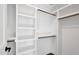 Custom walk-in closet with built-in shelving and ample storage space at 67 Farmstead Ct, Wendell, NC 27591