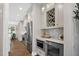 Well-appointed kitchen featuring stainless steel appliances, wine rack, and open layout at 67 Farmstead Ct, Wendell, NC 27591