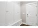 A modern mud room with custom cabinets and a bench at 67 Farmstead Ct, Wendell, NC 27591