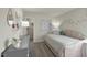 Charming bedroom featuring carpet, pastel decor, and unique butterfly wall accents at 708 Deschutes Dr, Garner, NC 27529