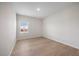 Cozy bedroom with hardwood floors and a large window at 708 Deschutes Dr, Garner, NC 27529